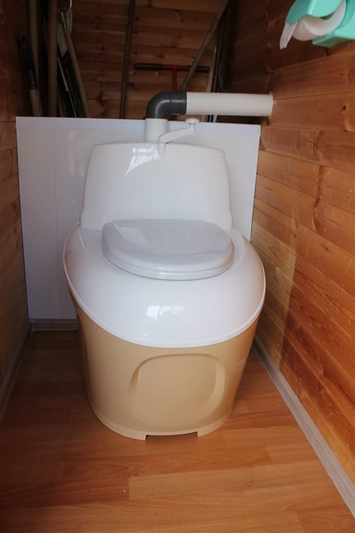Торфяний туалет для дачі фінська, принцип роботи, як вибрати